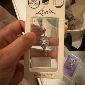 Claire's Silver Cubic Zirconia Flower Belly Ring both for $25 goes for more
